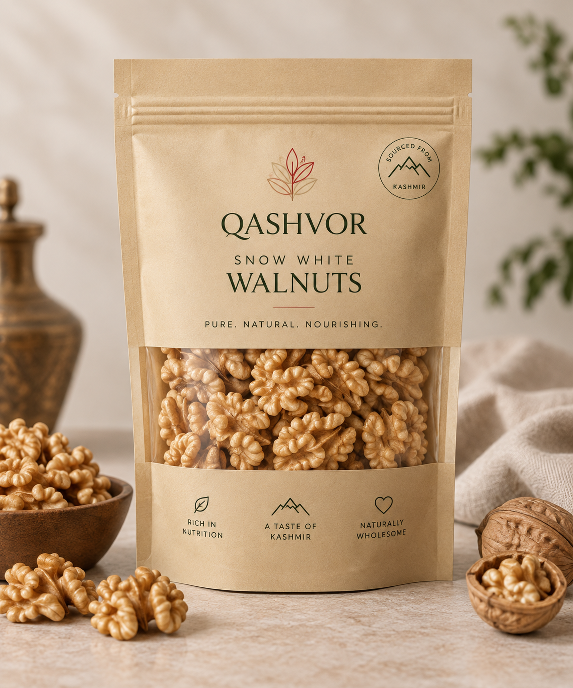 Qashvor Kashmiri walnuts in a kraft pouch with walnut kernels and whole walnuts